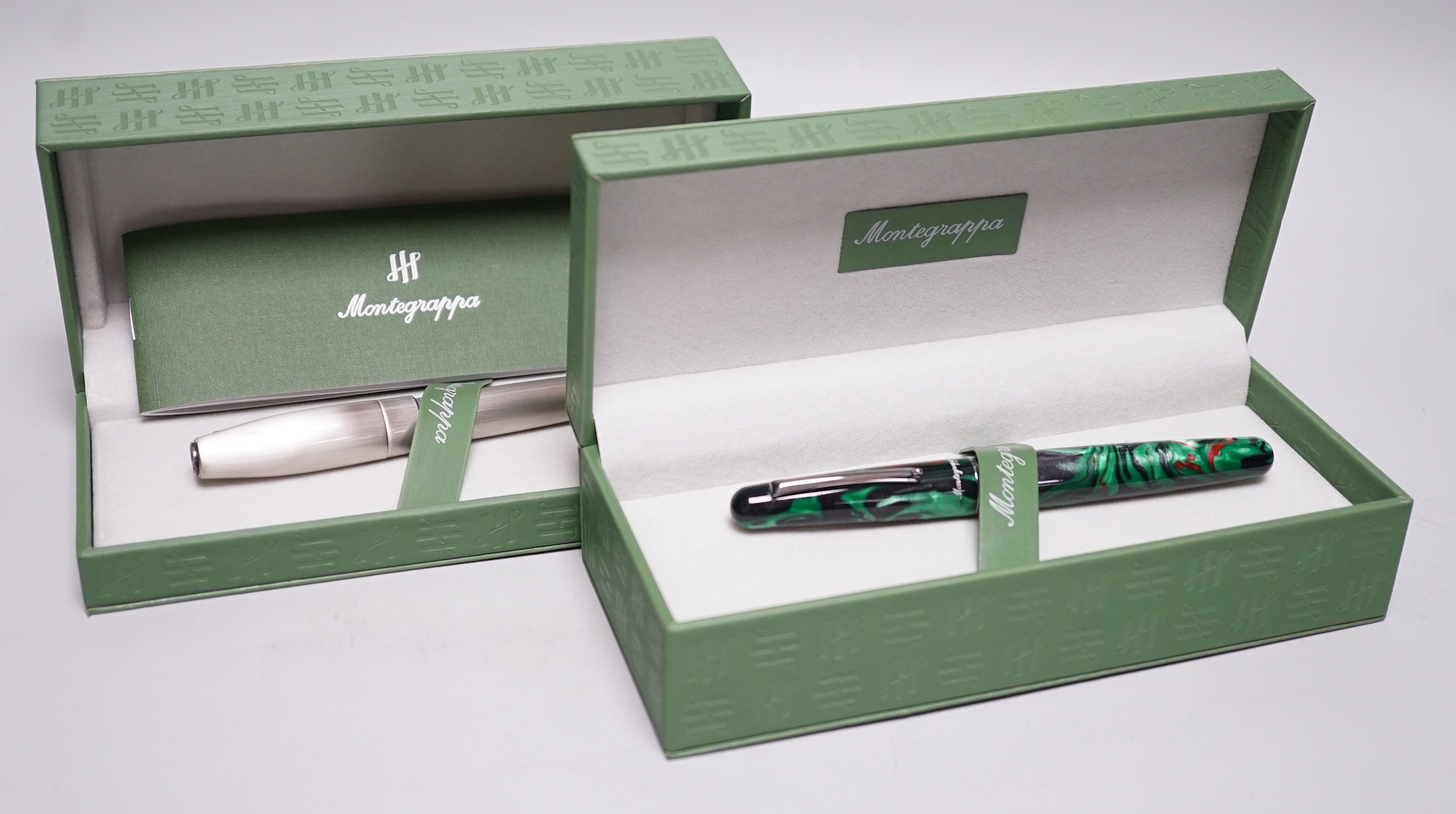 Two Montegrappa fountain pens; Elmo 01 Black Star Calla Lily and Silver mule, cased